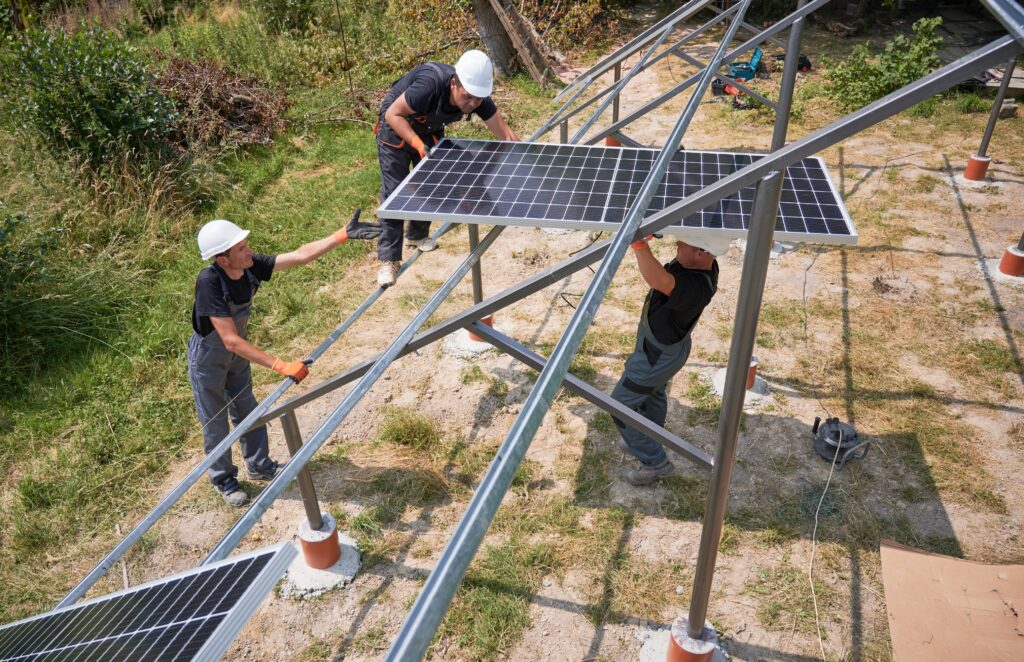male-workers-installing-solar-panels-sunny-day (1) Maintanance image